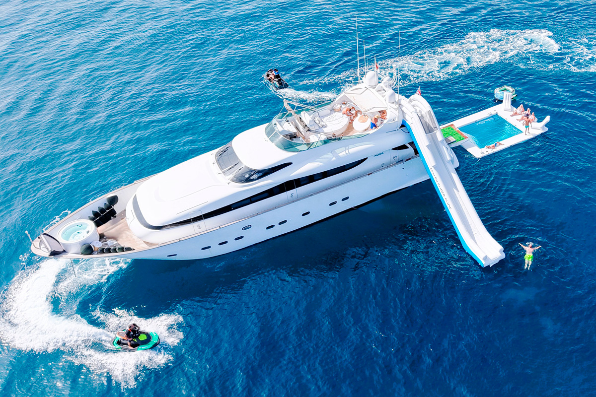 Maiora 26DP aerial view with jet ski, slide and floating pool